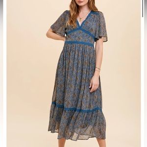 Flowy women’s dress blue with paisley pattern